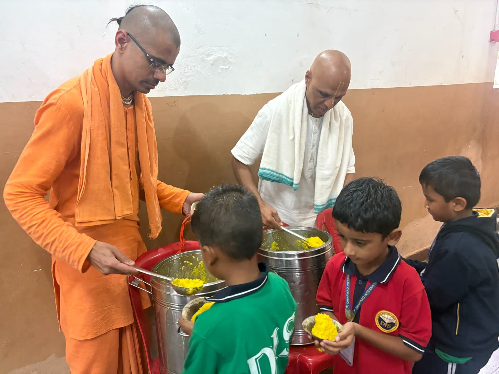 Lord Krishna at lunch with the gopas — the joy of sharing prasadam